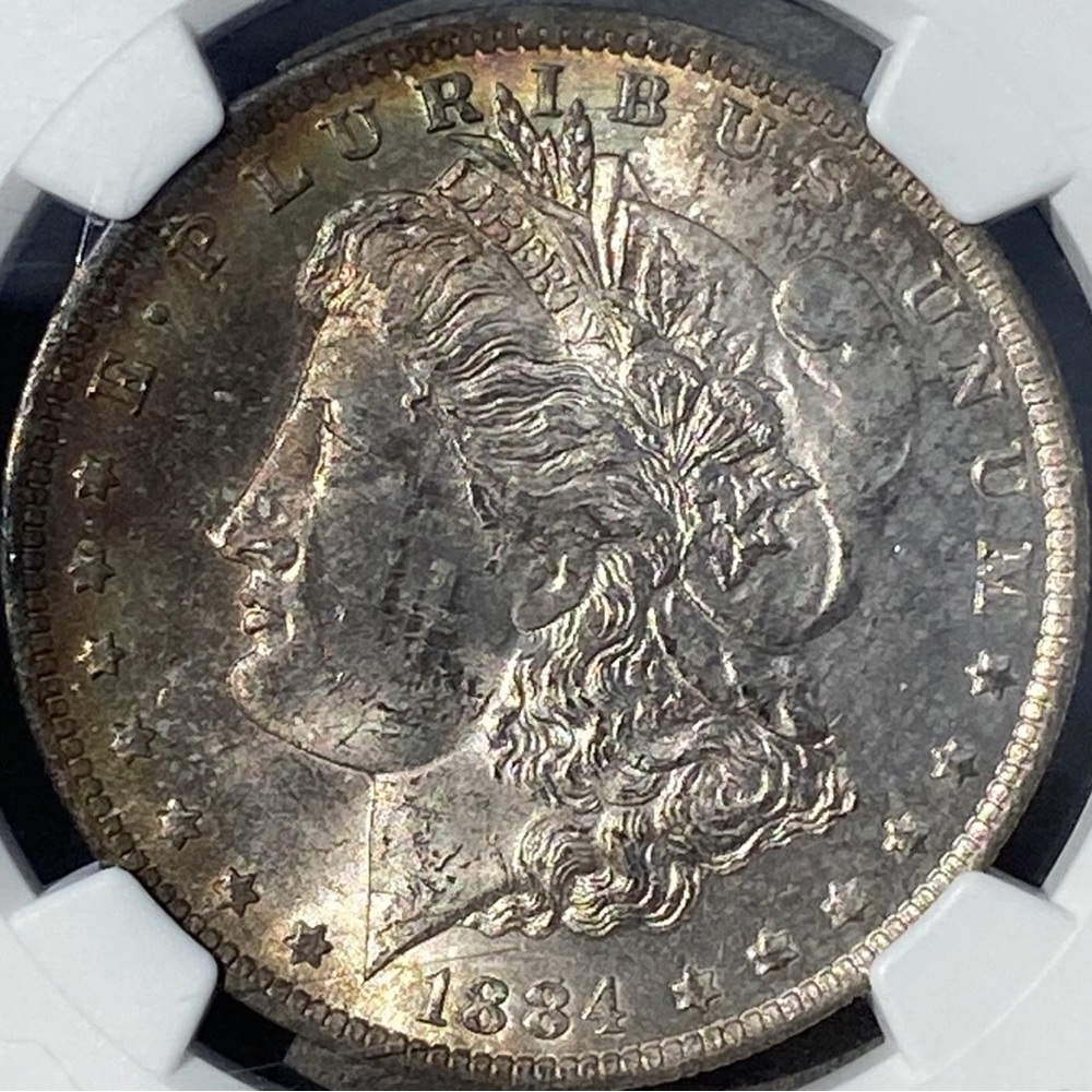 1884 O Morgan Silver Dollar - Certified - Uncirculated - Toned NGC MS 63